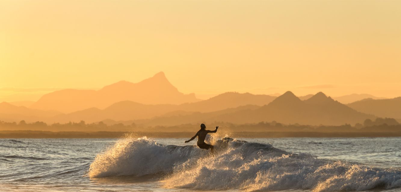 Be sure to catch a sunset wave while in Byron Bay.