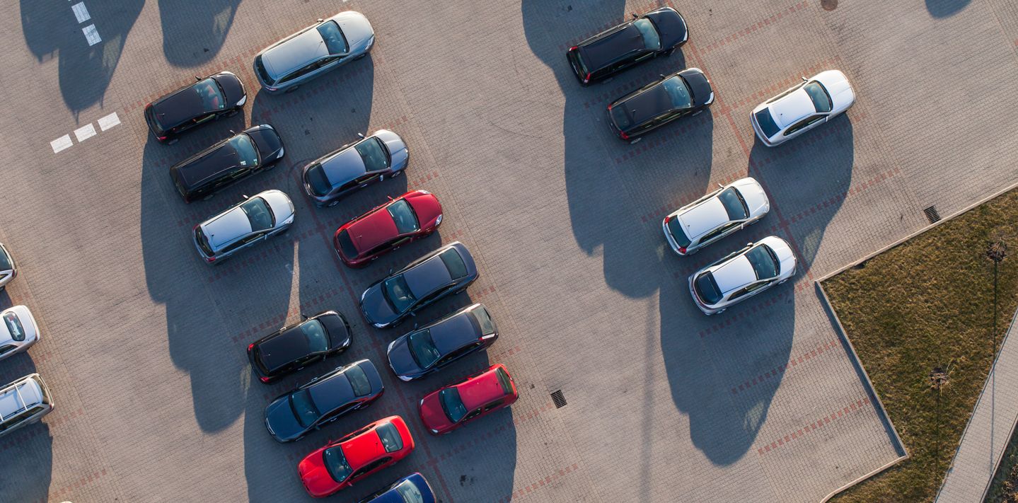 Cars in a parking area.