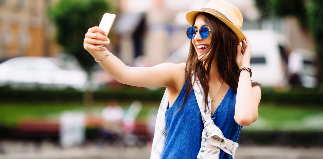 Woman taking a photo for Instagram.