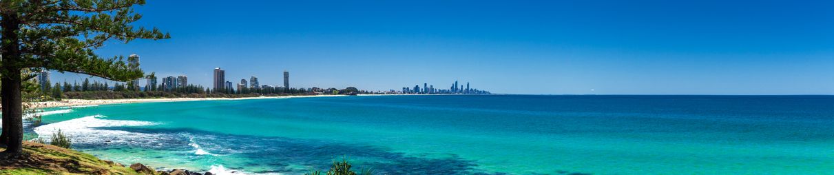 Gold Coast skyline and surfing beach visible from Burleigh Heads.